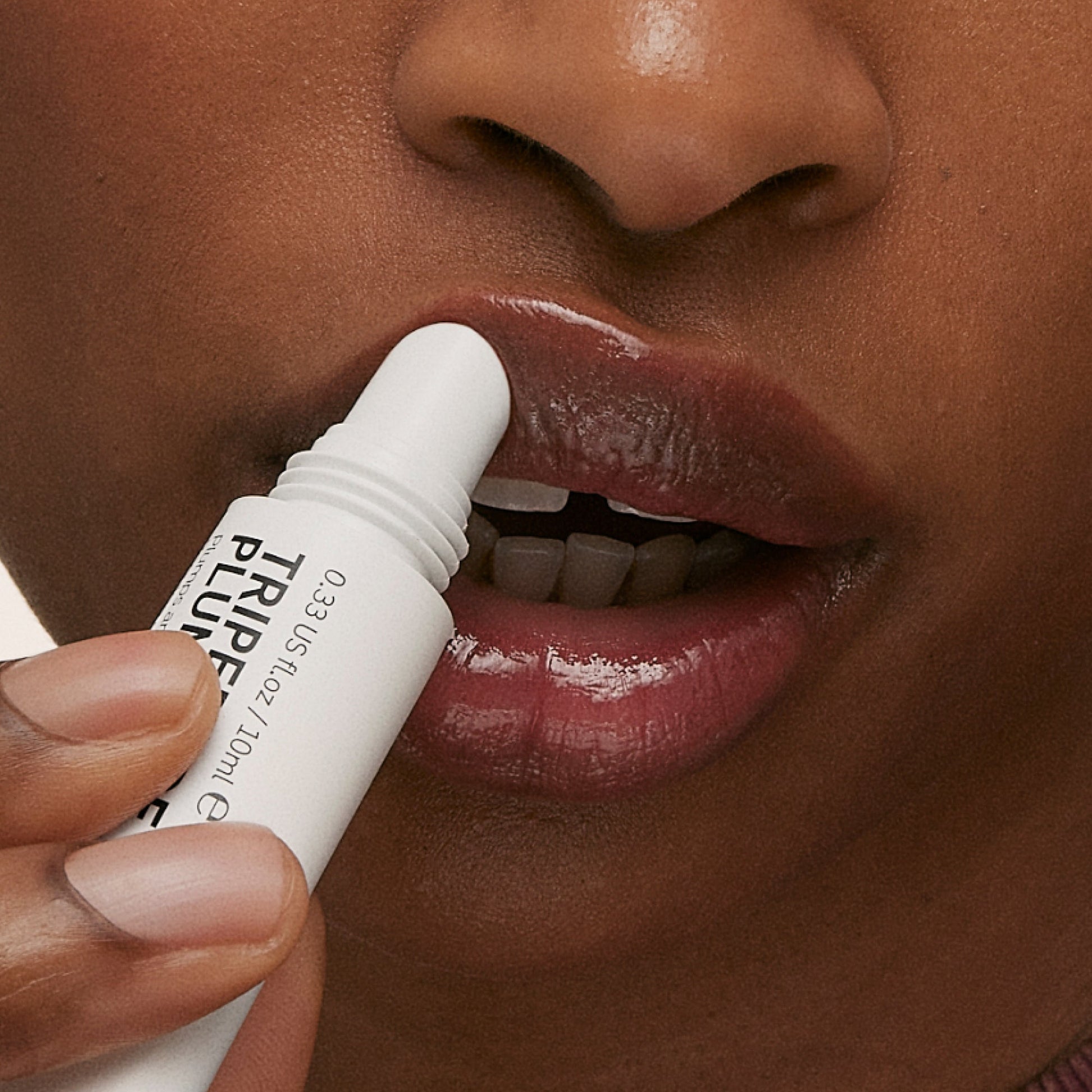 tripeptide-plumping-berry-lip-balm-e6 ApplicationBerry.jpg
